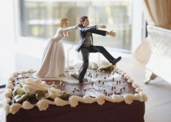 3729946-funny-wedding-cake-top-bride-chasing-groom
