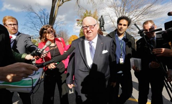 Now suspended senator Duffy arrives on Parliament Hill in Ottawa in this file photo from October 22, 2013. REUTERS/Chris Wattie/Files