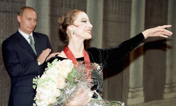 Russian President Vladimir Putin claps for prima ballerina Maya Plisetskaya at the start of a concert at Bolshoi Theatre in Moscow in this November 20, 2000 file photo. Plisetskaya, considered one of the greatest ballerinas of the 20th century, died of a heart attack in Germany on May 2, 2015, at the age of 89, Bolshoi Theatre director Vladimir Urin announced.  REUTERS/Stringer/Files