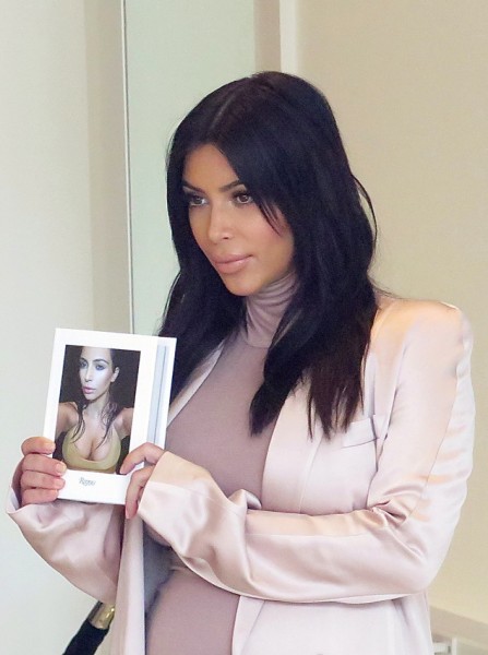 Kim Kardashian does her Selfie Book appearance at Dash Boutique on Melrose Pictured: Kim Kardashian Ref: SPL1096065  060815   Picture by: MONEY$HOT / Splash News Splash News and Pictures Los Angeles:310-821-2666 New York:212-619-2666 London:870-934-2666 photodesk@splashnews.com 