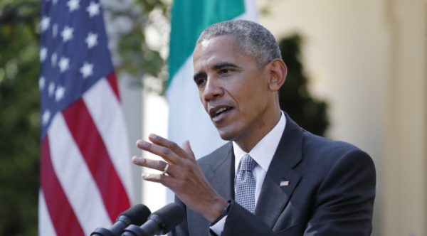 President Barack Obama answers a question during a joint news conference with Italian Prime Minister Matteo Renzi in the Rose Garden of the White House in Washington, Tuesday, Oct. 18, 2016. (AP Photo/Pablo Martinez Monsivais)